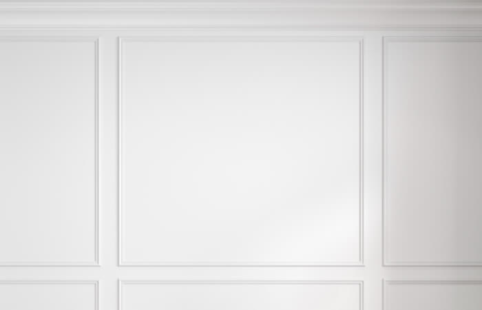 A white wainscoting wall panel.