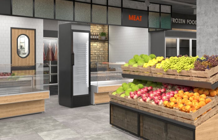 A concept rendering of a grocery store with the produce department in the foreground, and the meat and frozen food departments in the background.
