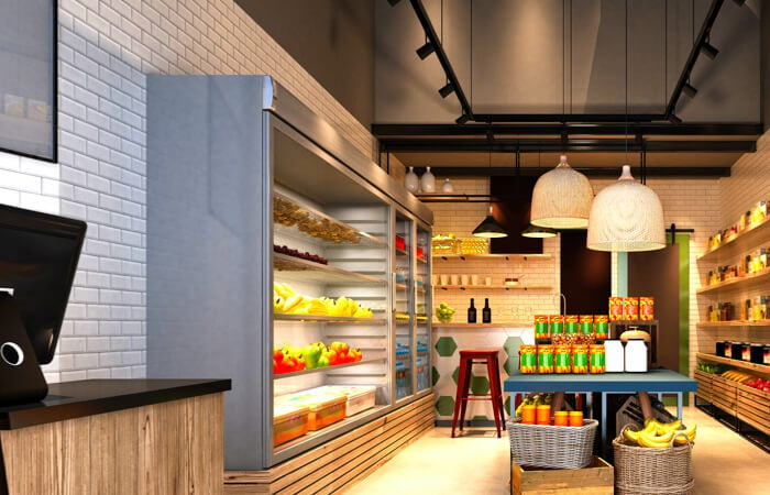 Rendering of an industrial-style grocery store interior. Refrigerator cases sit against the left wall and dry packaged goods line the right wall. A table with jarred products is in the middle of the space.
